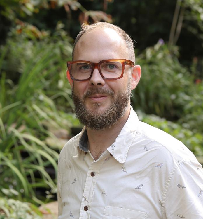 A photo of Corey McMillan, PhD.
